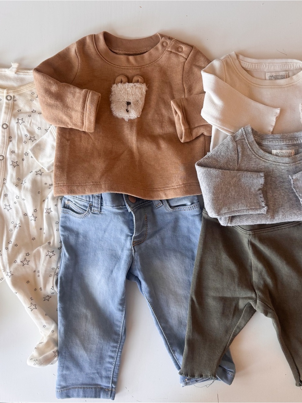 Lot of 0-3 month clothing. Featuring gap Quincy Mae Gymboree